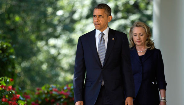 Secretary of State Hillary Clinton follows President Barack Obama to the Rose Garden of the White House in Washington, Wednesday, Sept. 12, 2012, to deliver a statement on the death of U.S. ambassador to Libya Christopher Stevens. /AP Photo/Evan Vucci