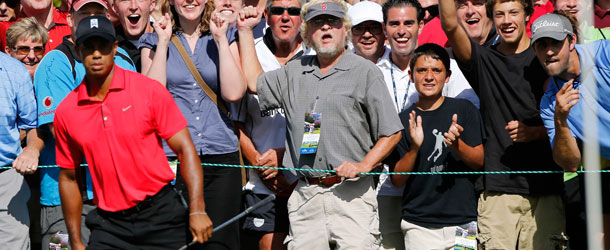 Tiger Woods, foreground left, during the final round of the Deutsche Bank Championship PGA golf tournament at TPC Boston in Norton, Mass., Monday, Sept. 3, 2012. /AP Photo/Michael Dwyer