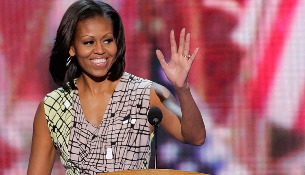 First Lady Michelle Obama waves from the podium during a sound check at the Democratic National Convention in Charlotte, N.C., on Monday, Sept. 3, 2012. /AP Photo/J. Scott Applewhite