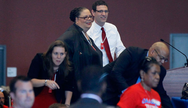 Karen Lewis, president of the Chicago teachers union, left, and vice president Jesse Sharkey stand before a meeting of the union's House of Delegates Friday, Sept. 14, 2012, in Chicago. /AP Photo/Charles Rex Arbogast