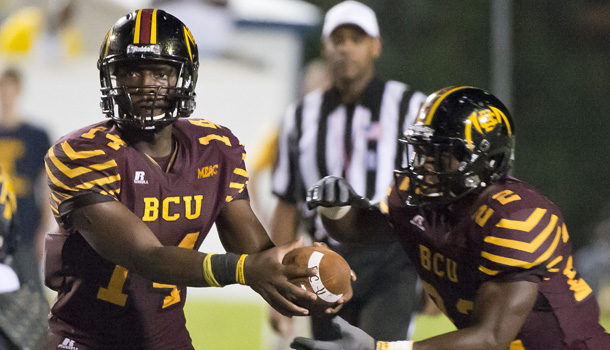 BCU Wildcats quarterback Quentin Williams handsoff to running back Rodney Scott during NCAA Football game action between the North Carolina A&T Aggies and the Bethune-Cookman on Oct. 6. /Cal Sport Media via AP Images