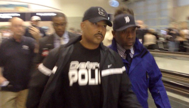 Detroit Police Chief Ralph Godbee arrived at Detroit Metro Airport in Romulus, Mich., on Wednesday, Oct. 3, 2012 from a flight from San Diego. Godbee was greeted at the gate with a throng of reporters. /AP Photo/Detroit Free Press, Tammy Stables Battaglia