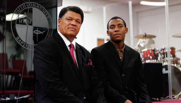 Rev. Richard Dunn, l, and his son, Rev. Richard Dunn III, are seen in Miami, Tuesday, Oct. 2, 2012, as they discuss their plans to motivate church members to vote in the upcoming elections. /AP Photo/J Pat Carter