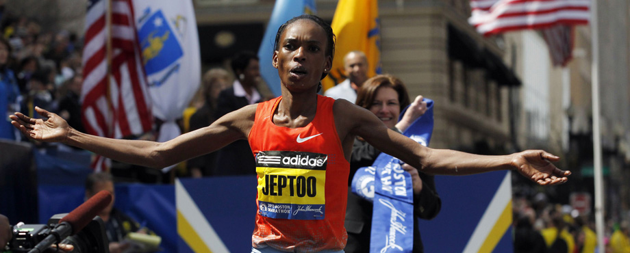 Rita Jeptoo of Kenya successfully defended the Boston Marathon title she said she could not enjoy a year ago after the fatal bombings.